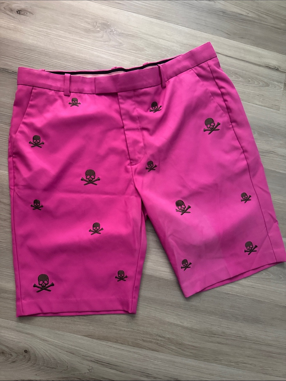 G/FORE Hot Pink Golf Shorts with Black Skull Detail